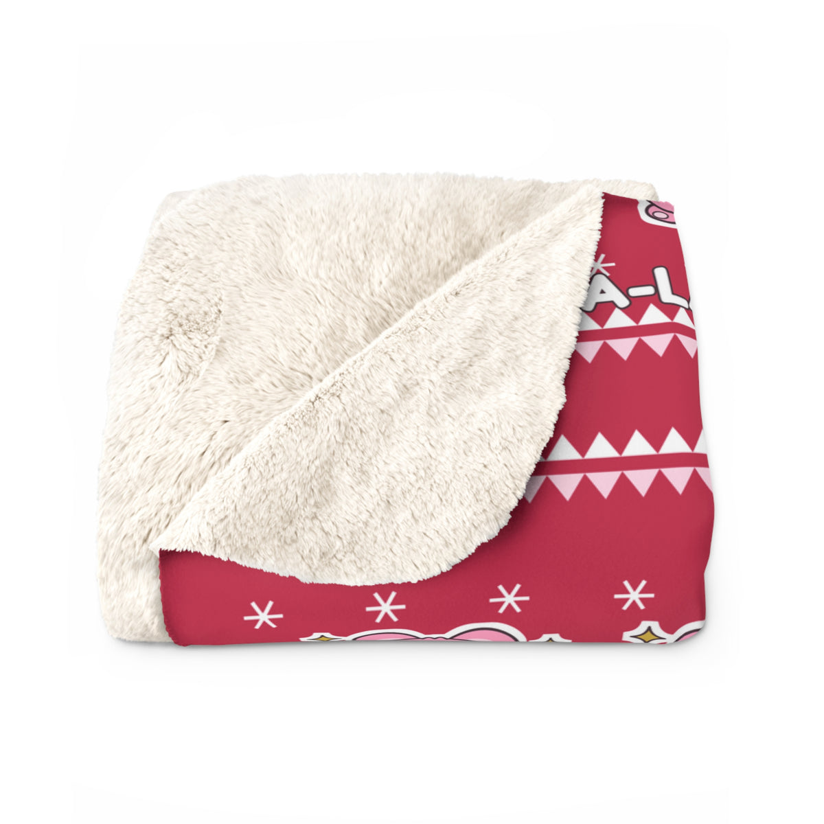 Pink koala Christmas blanket draped over a sofa in a living room