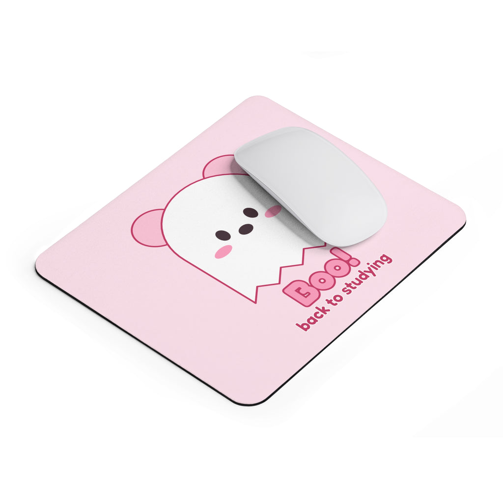 Ghost Koa pink mouse pad angled on a desk