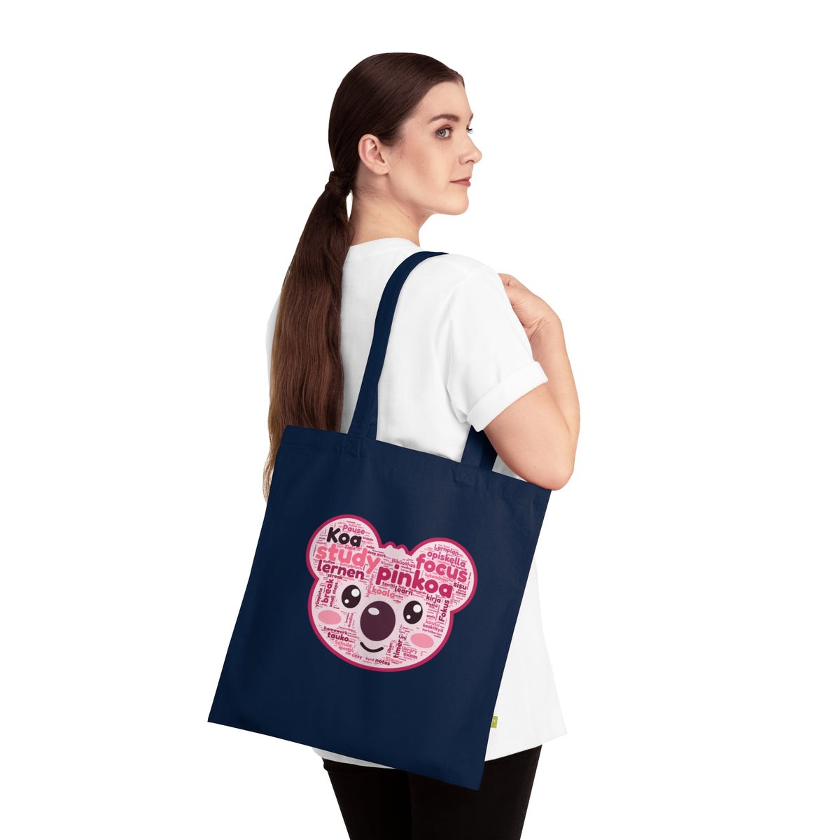 Koa study words tote bag flat lay with denim and sunflower